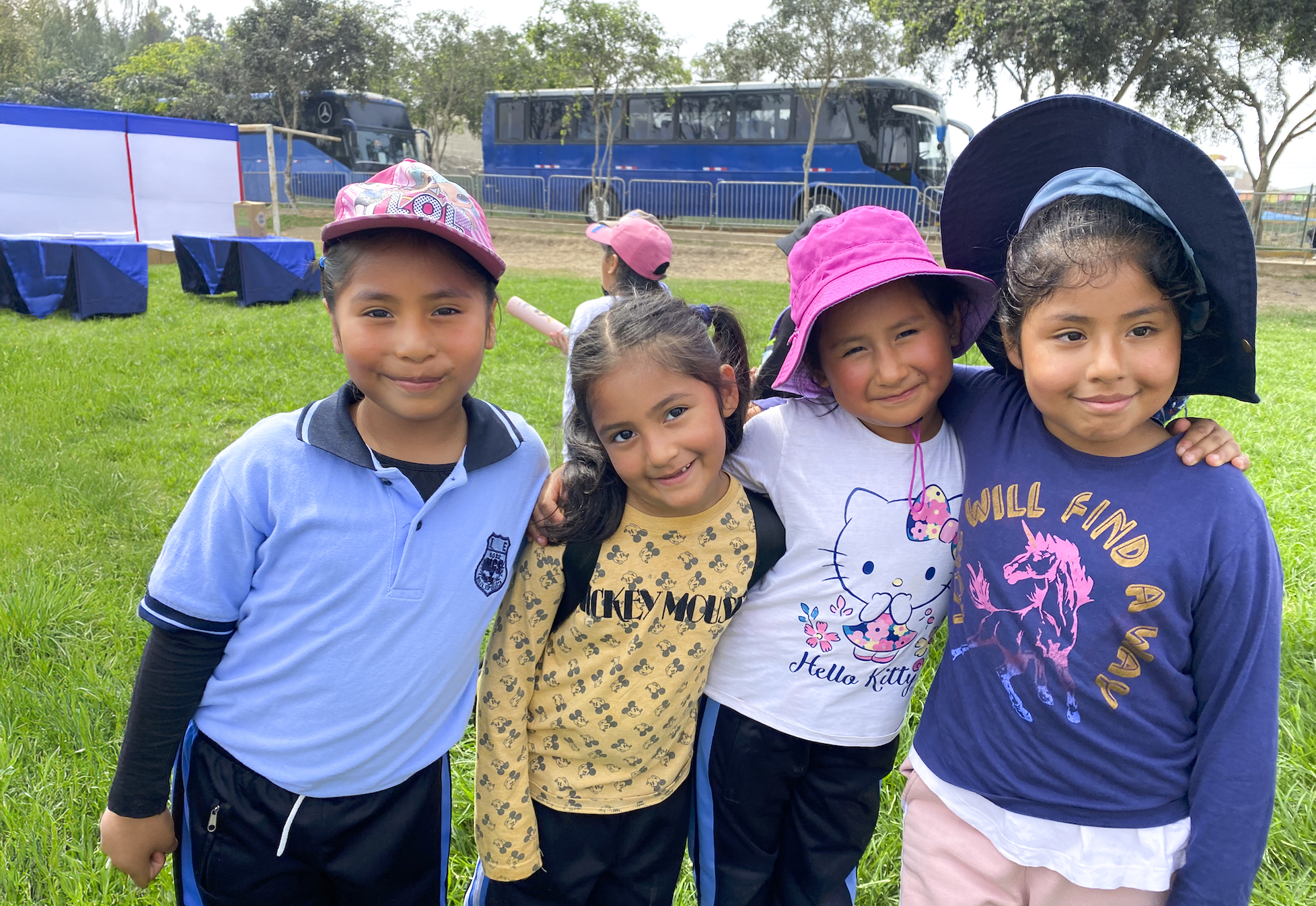 Two people working outside celebrate